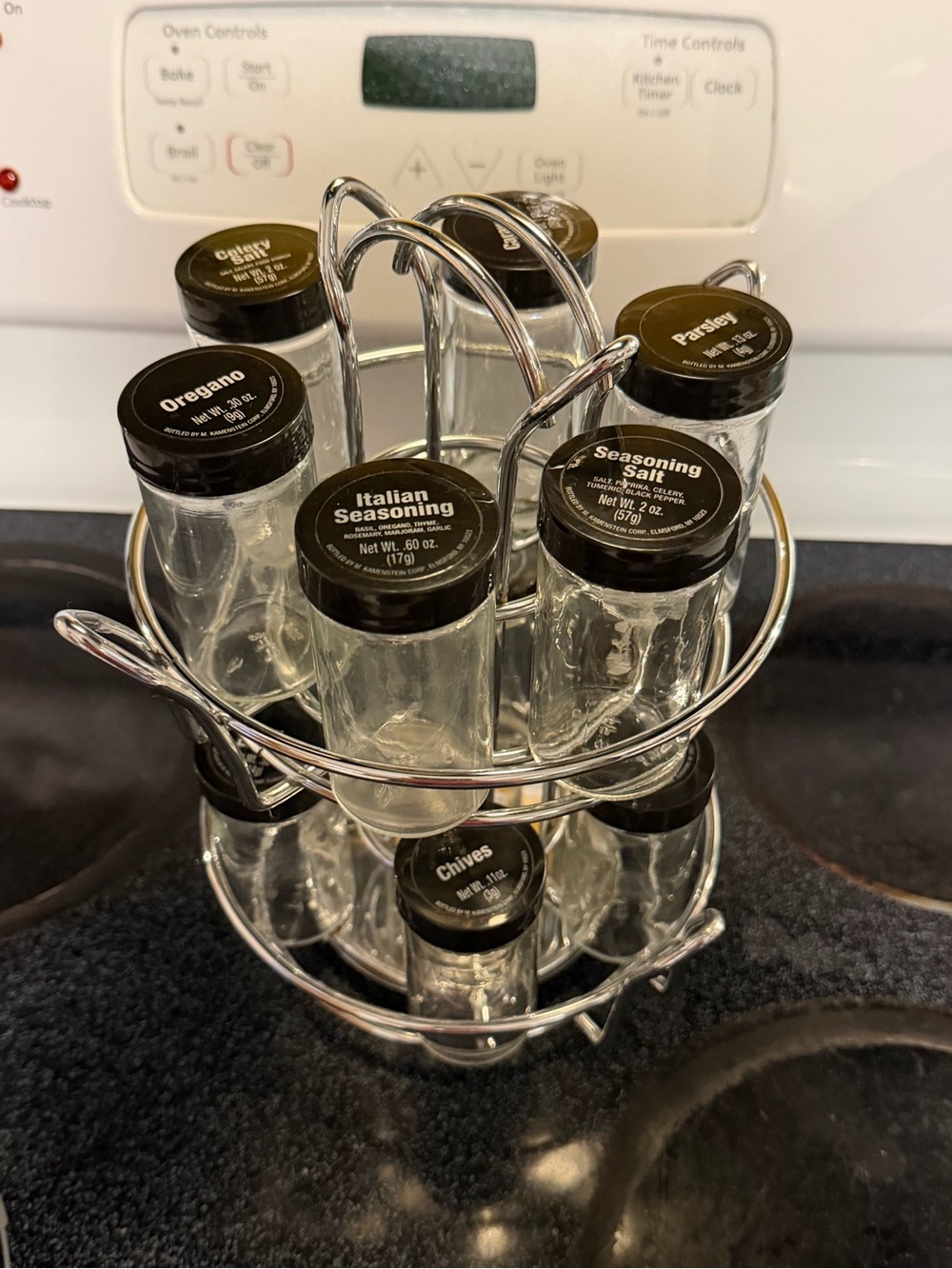 Chrome Rotating Spice Rack with Black-Lid Glass Jars - Home Kitchen